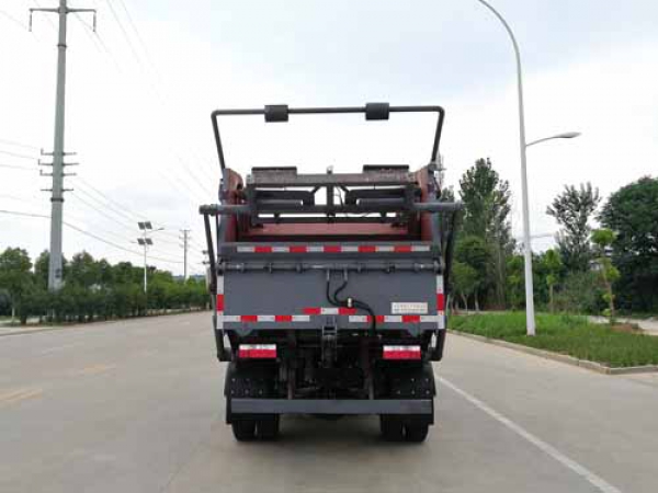 東風(fēng)小多利卡國(guó)六后裝高位掛桶壓縮式垃圾車(chē)